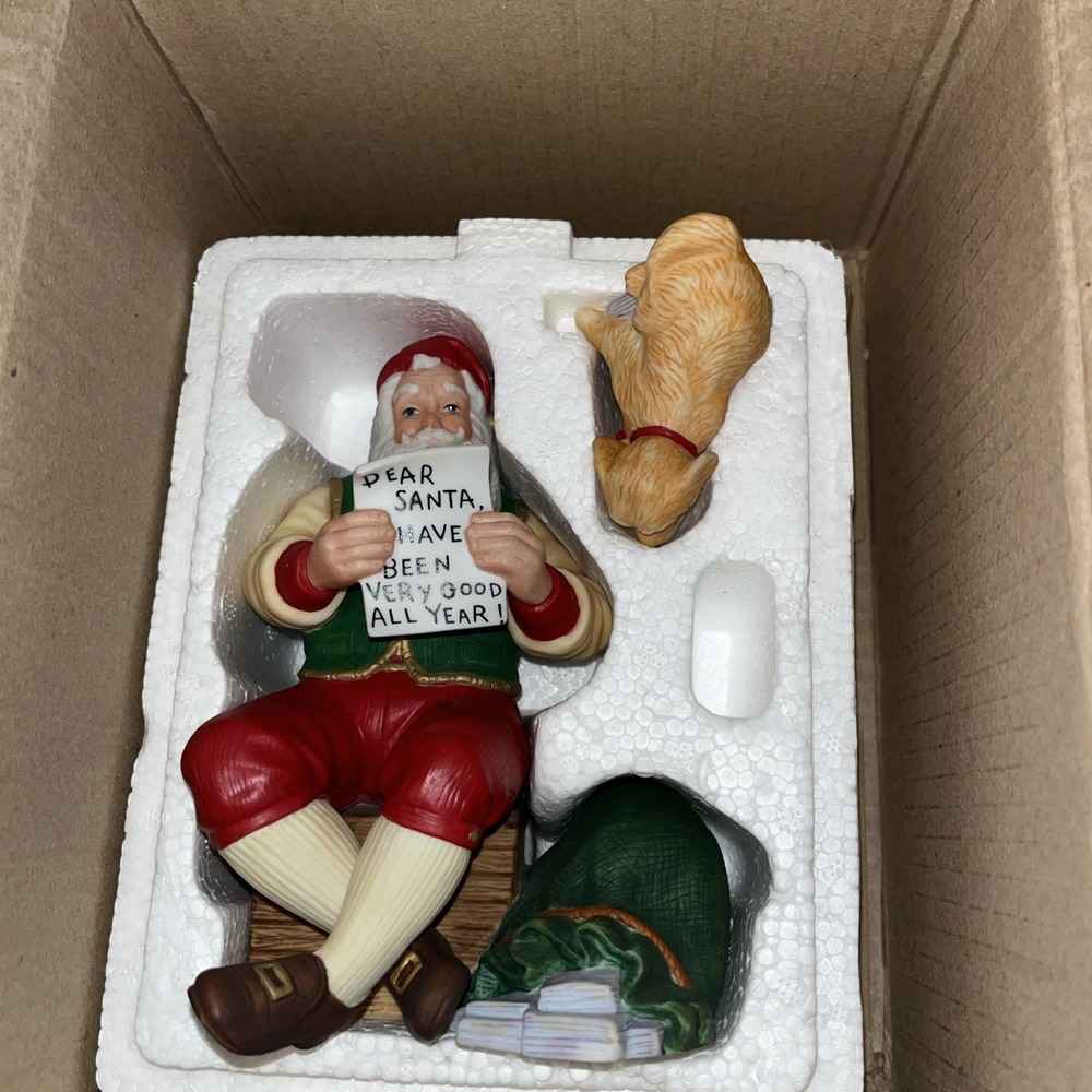 The Lenox 1998 Santa with dog Limited Edition.